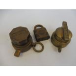 A Regent bronze bulk tank locking cap, another for R.O.C. Ltd and an Esso Yale padlock.