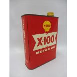 A Shell X-100 Motor Oil litre oil can of bright colour.