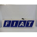 A Fiat illuminated lightbox, 63" w x 16" h x 7 1/2" d.