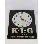 A K.L.G. Plugs advertising glass fronted wall clock by Smith Sectric, 10 1/2 x 14".