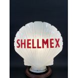A Shellmex glass petrol pump globe by Hailware, chips to the neck and letters repainted badly.