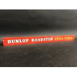 A Dunlop Roadster Cycle Tyres shelf strip.