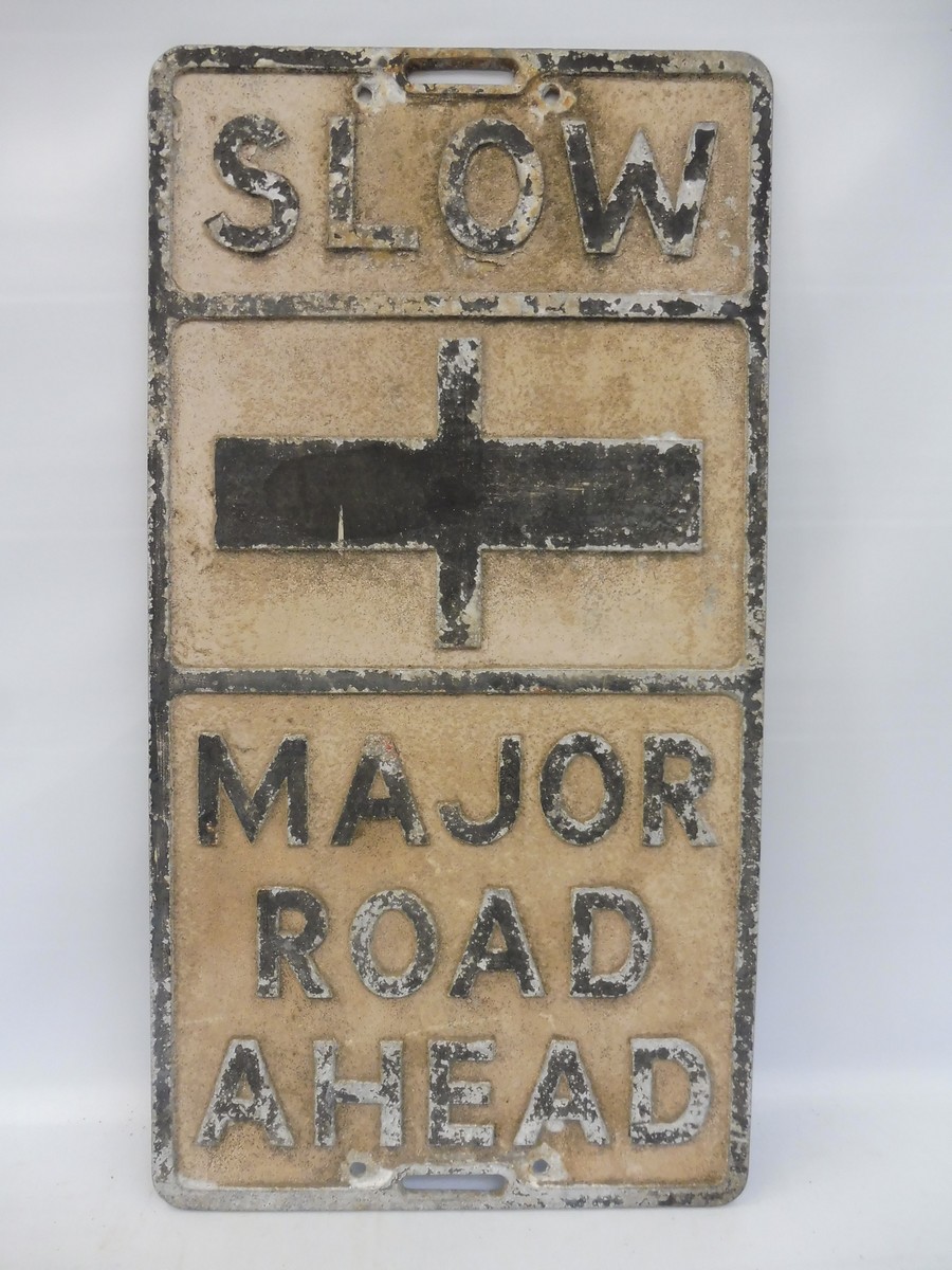 A pre-war 'Slow Major Road Ahead' cast aluminium road sign by less well known manufacturer Hawkseye,