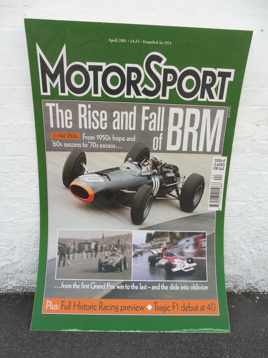 A large showroom display board depicting the front cover of MotorSport magazine, April 2001 'The