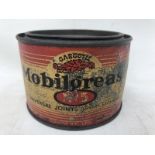 A Gargoyle Mobil Grease no. 5 circular tin.