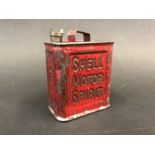 A Shell Motor Spirit miniature perfume container in the shape of a two gallon petrol can.