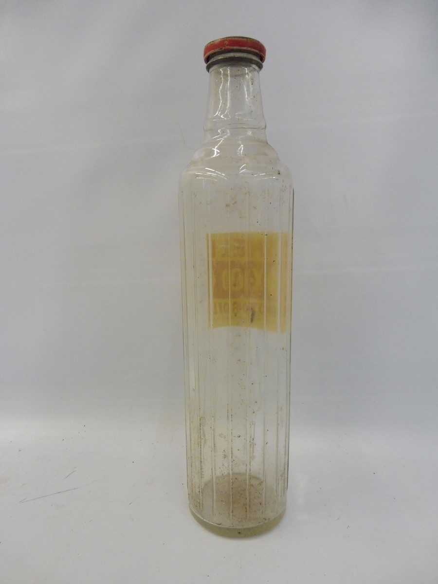 A Shell X-100 glass quart oil bottle. - Image 2 of 3