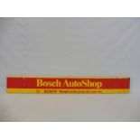 A Bosch Autoshop rectangular tin sign, 49 x 6 1/4".