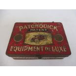 A Patchquick Equipment De Luxe rectangular tin with an image of an Edwardian car to the lid,