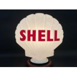 A Shell plastic petrol pump globe, in good condition.