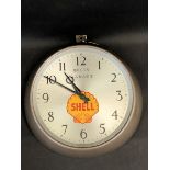 A Bells Garage Shell garage showroom circular wall clock by F.W. Elliott Ltd of Croydon, dated 1960;