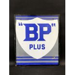 A BP Plus enamel sign, in very good condition, 21 x 24".