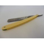 A rare Gargoyle Marine Oils promotional cut throat razor.