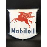 A Mobiloil 'flying pegasus' enamel sign, dated 1953, in good condition, 12 x 12".