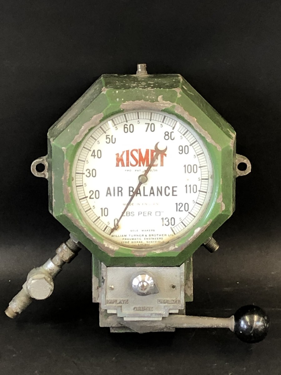 A Kismet Air Balance octagonal gauge, by repute working when removed from the garage where it was in
