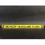 A Dunlop Mudguard Flaps shelf strip in good condition.