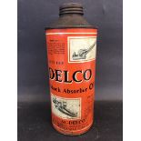 A Delco Shock Absorber Oil cylindrical quart can of good colour.