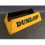 A Dunlop tyres advertising tyre display stand.