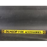 A Dunlop Tyre Accessories shelf strip.