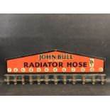 A John Bull Heat Resisting Radiator Hose wall mounted hanging display rack in good condition, 31 1/2