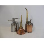 A 'Neverdrip' copper and brass oiler, an Enots chrome plated oiler plus a copper and brass mounted