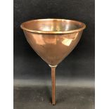 A good quality copper funnel.