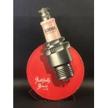 A Lodge spark plugs die-cut showcard, 9 3/4" w x 15 3/4" h.