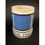An Avon Tyres promotional pottery tankard by Holkham Pottery.