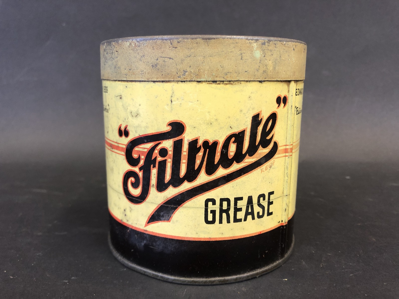 A Filtrate Grease tin.