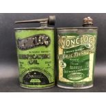 Two Nonclog Lubricating Oil oval cans.