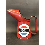 A Regent pint oil measure.