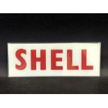 A small Shell glass petrol pump brand insert, 11 x 4 1/4".