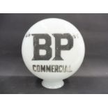 A rare BP Commercial pill shaped glass petrol pump globe in good original condition, fading to