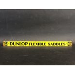 A Dunlop Flexible Saddles shelf strip in good condition.