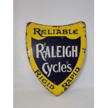 A Raleigh Cycles shield shaped double sided enamel sign by Sells Ltd London E.C. 18 1/4 x 24".