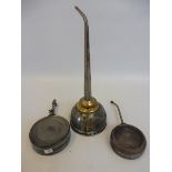 A Kaye's Patent brass mounted steel oiler with a long spout and two circular oilers, one being