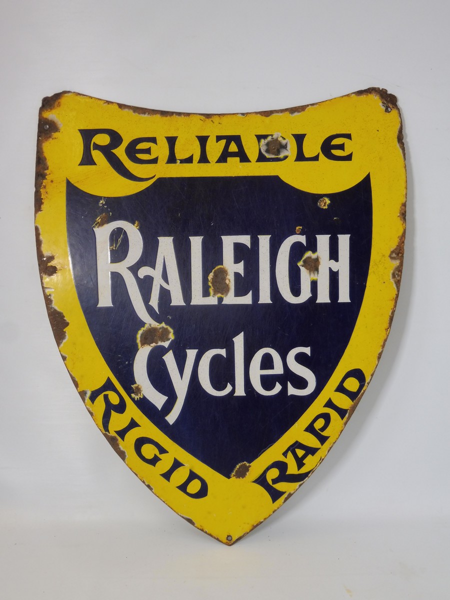 A Raleigh Cycles shield shaped double sided enamel sign by Sells Ltd London E.C. 18 1/4 x 24". - Image 2 of 2