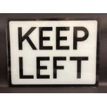 A 'Keep Left' rectangular glass panel from an illuminated road sign, 24 1/2 x 18 3/4".