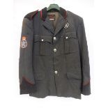 An RAC jacket with cloth insignia, made by Unique Uniforms.