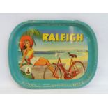 A Raleigh bicycle advertising drinks tray in very good bright condition.