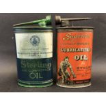 A Superior Lubricating Oil oval can and a second for Sterling Air Compression.