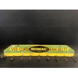 A Romac Vee-Cord Fan Belt wall mounted advertising holder, 33" wide x 5 3/4" high.