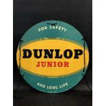 A Dunlop Junior 'for safety and long life' bicycle advertising garage card sign, 17 3/4" diameter.