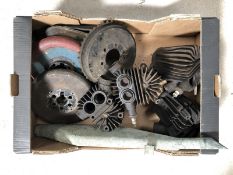 A box of Douglas parts to include four cylinders, two flywheels and a silencer etc.