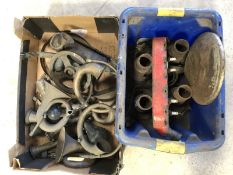 Two boxes of assorted parts including cylinder head, hubs, horns etc.