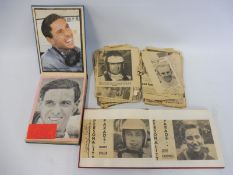 Two autograph albums containing an assortment of racing driver signatures including Jim Clark,