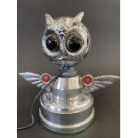 A rare illuminated owl's head/motormeter mascot.