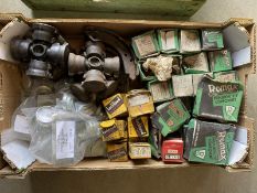A tray of new old stock vintage car parts.