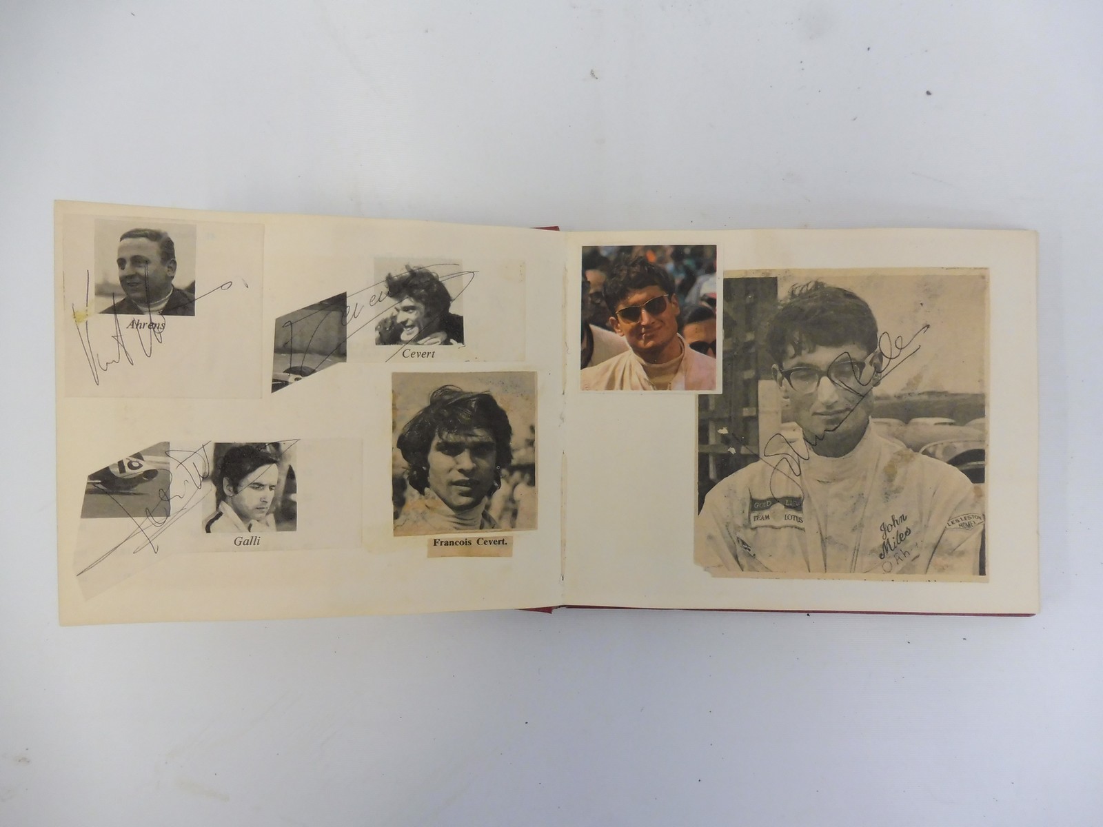 Two autograph albums containing an assortment of racing driver signatures including Jim Clark, - Image 10 of 12