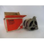 A boxed Lucas alternator exchange unit, new old stock, to suit Ford Capri or Cortina etc.